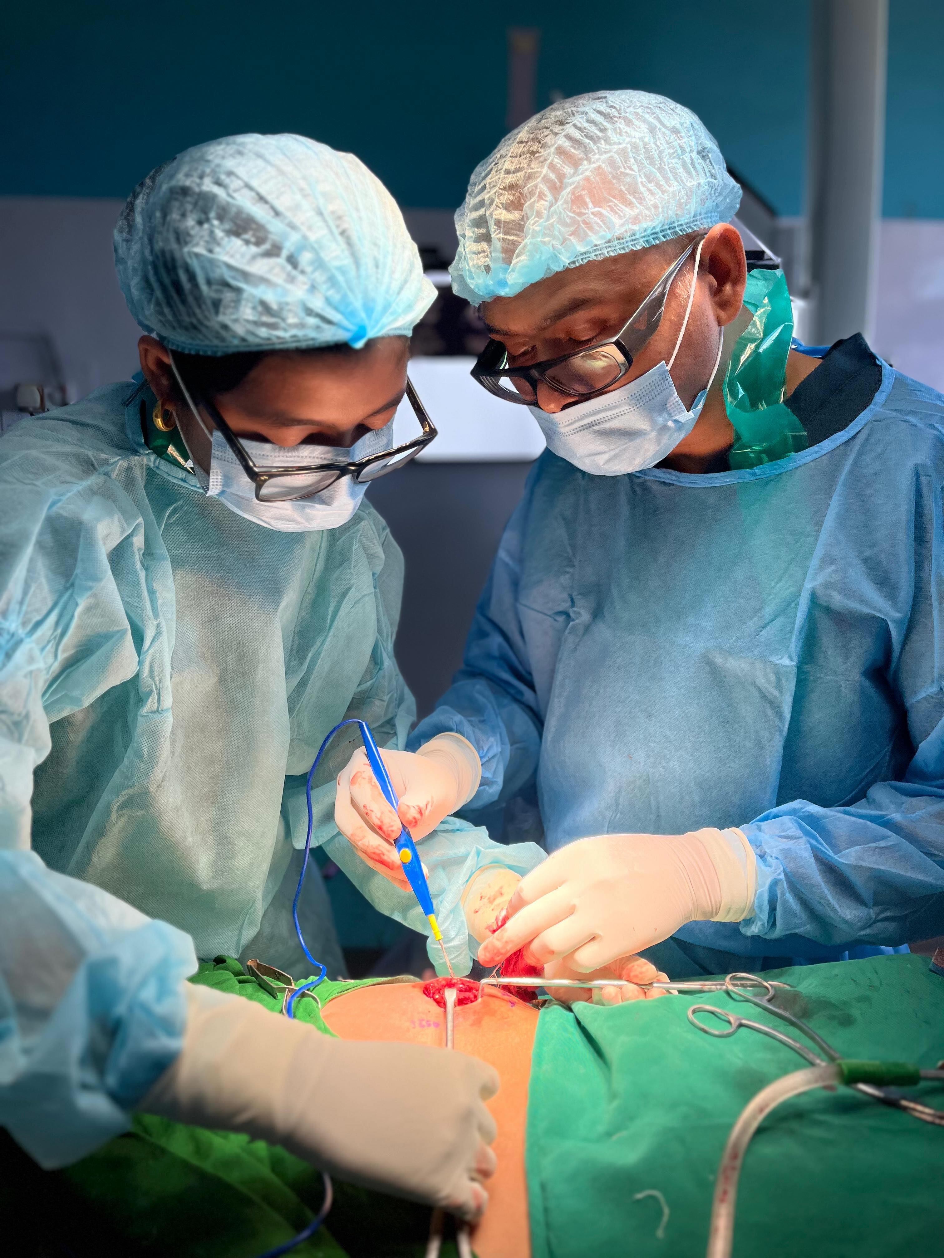 Dr. Barnakshi Deka performing surgical procedure in operating theatre