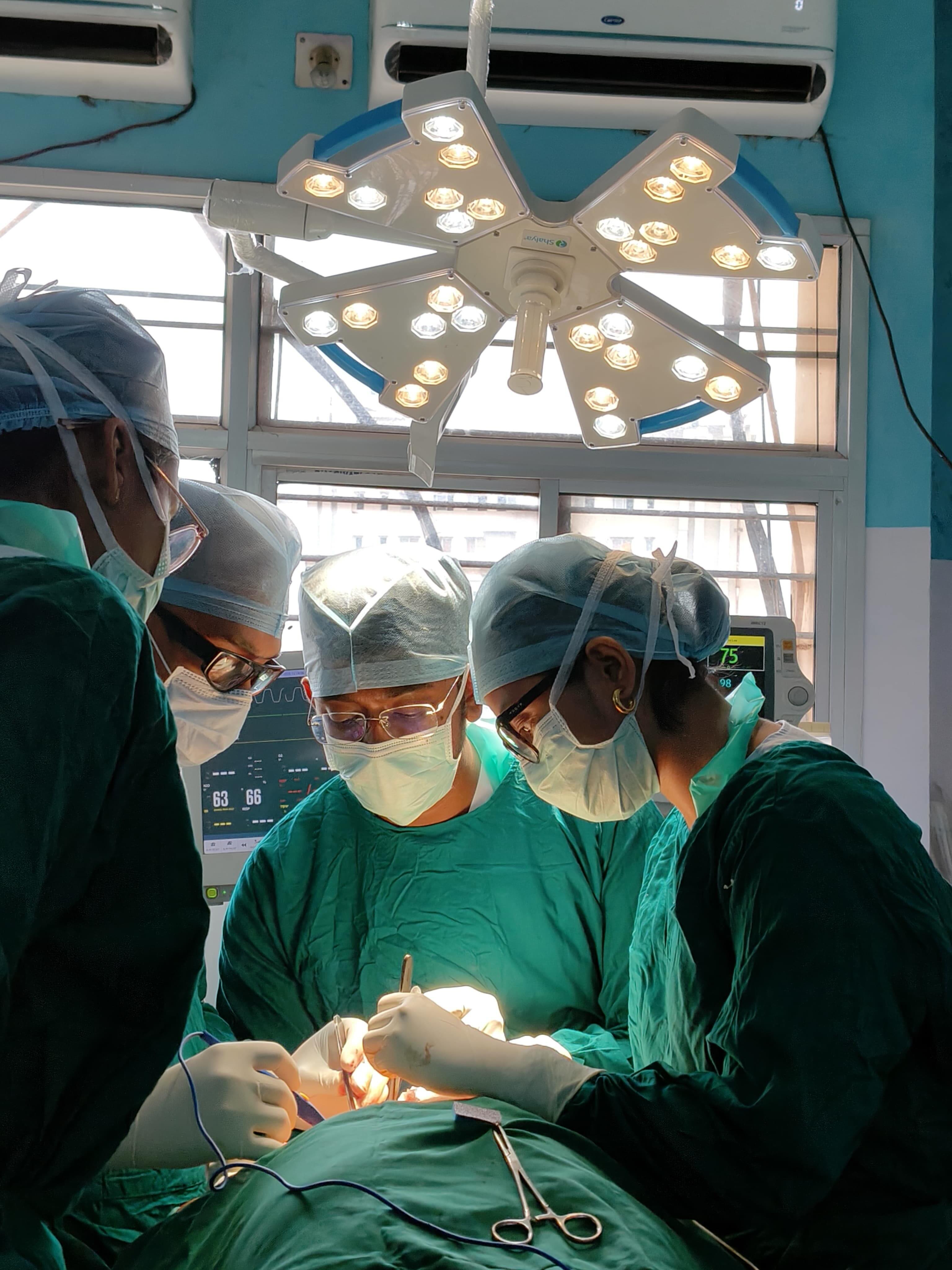 Multi-specialty surgical team in the operating theatre
